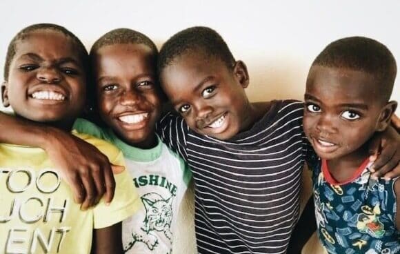 Holistic Haitian Alliance | 2023 over the edge smiling Haitian boys
