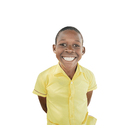 Holistic Haitian Alliance | impact hha partners smiling Haitian boy with yellow shirt