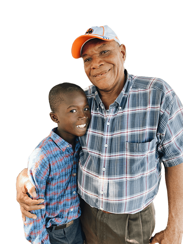 Holistic Haitian Alliance | Resolutions - cutout bg image older Haitian gentleman and Haitian child