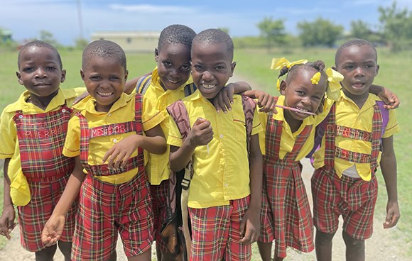 A group of Haitian children in their school uniforms